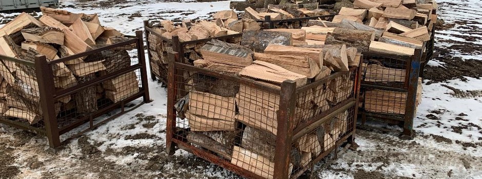 Bins of hardwood firewood getting ready to be delivered Aurora.