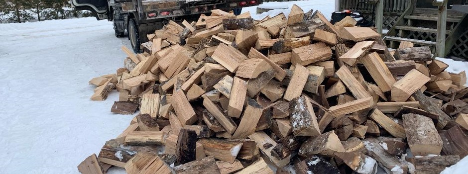 Truckload of Firewood being delivered to Aurora Home.